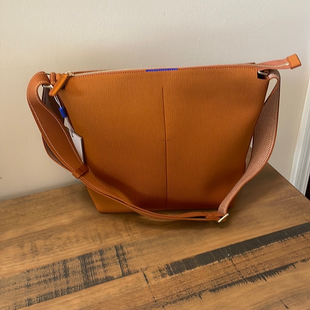 Rothy’s Mini Zip bucket bag. Brand new - tags still on. Retails for 179.